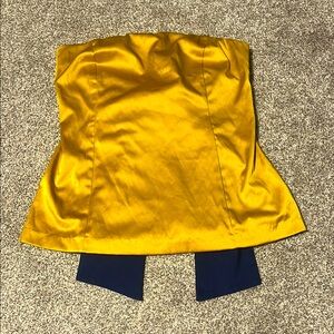 Gold Strapless top with Navy Bow.
